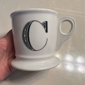 Anthtopologie white coffe cup letter C